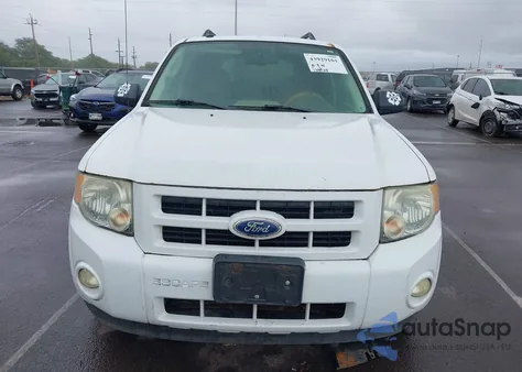 2011 Ford Escape Hybrid z USA, uszkodzony, nr VIN 1FMCU5K31BKA33789